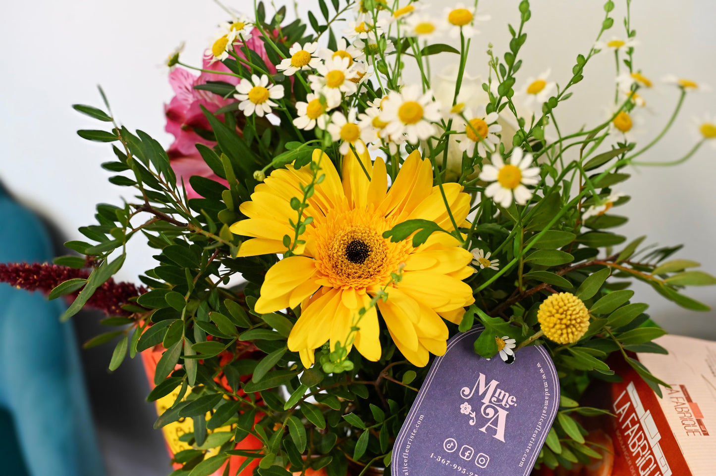 Basket of fruits, flowers and delicacies